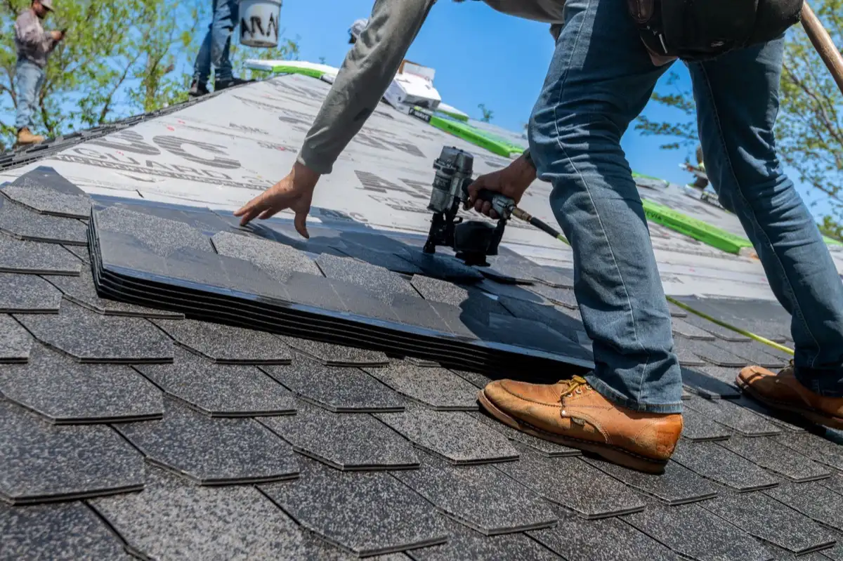 Inspecting an asphalt shingle slope after a hailstorm in Gilroy, CA