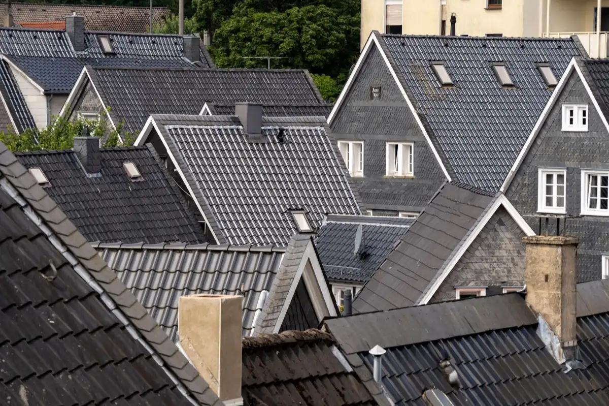 Steep roof eaves and gutter lines on houses in Gilroy, CA